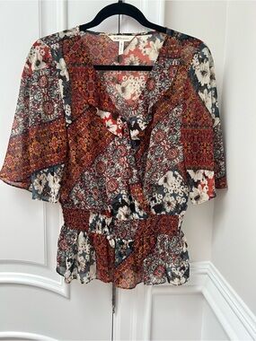 BCBGeneration Red Multi-Print V-Neck Smocked Peplum Top